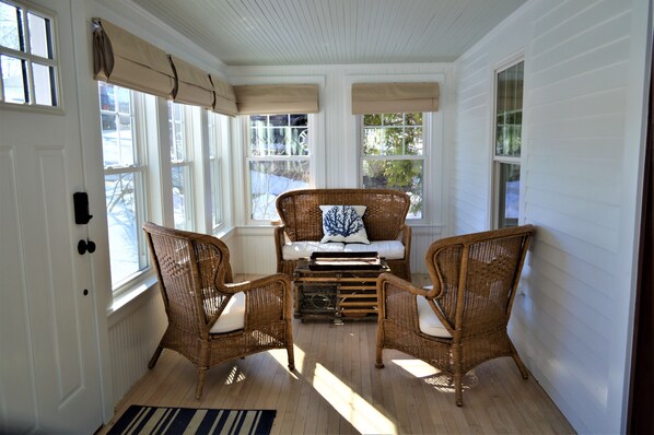 Relax on the  front porch with a coffee or a book!