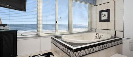 Master Bedroom with jacuzzi tub looking over the ocean