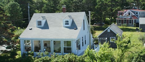 Cottage property has a charming antique shed.