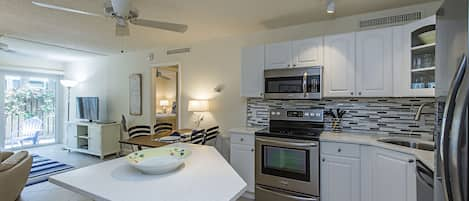 View from the kitchen towards living room and patio