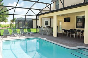 Pool, deck and Lanai with bar, BBQ/Grill, TV, dining table (8) & 4-seat sofa set
