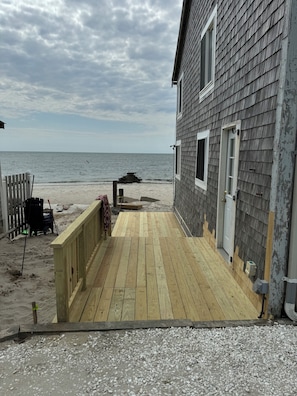 Private deck with picnic table and gas grill for outdoor dining or lounging