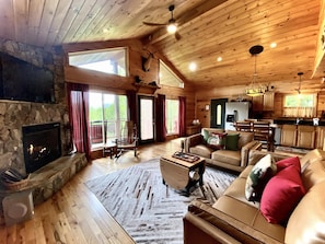 Open floor plan with a wall of glass to let the in Nature and the Incredible Mountain Views