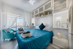 Door View of the Bedroom (Teal Decor)