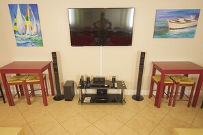 60' plus flat screen, Playstation, Wii, Sound System.