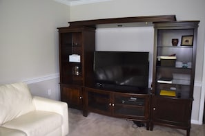 Entertainment center in the second family room.