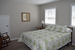 Queen bedroom with attached Jack and Jill bathroom with a shower. 