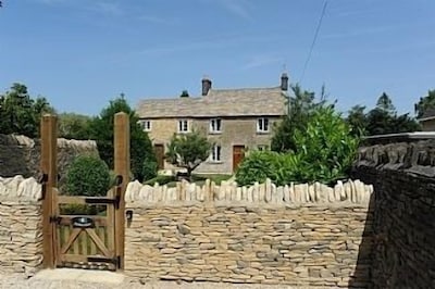 Roseleigh Cottage in the heart of Stow-on-the-Wold with parking for 2 cars.