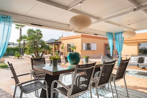 Covered porch with dining area