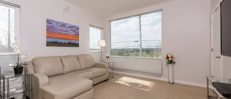 Front living/bedroom with golf course view