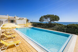 Swimming pool with sun terraces to sunbathe.