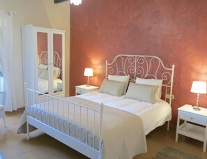 Master bedroom with fan and hot and cold air conditioning