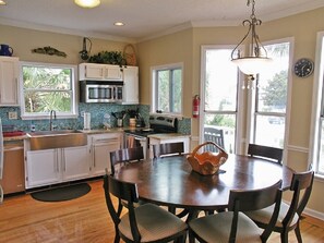 Kitchen with seating for 5 or 6 if you add the leaf (under King bed upstairs)