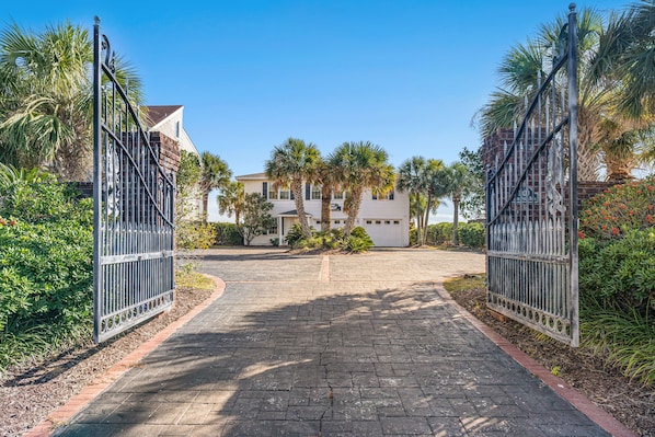 Sail off to your very own Isle of Palms at this oceanfront luxury home.