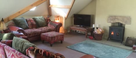 Huge living room with country cottage feel (just with more head room)