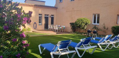 House with garden at 30 meter from the sand beach of La Fosca. 