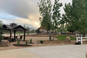 Lower gazebo and fire pit, sand volleyball court