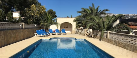 Pool area showing pool Casita at the end