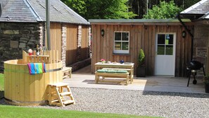 BBQ, Dine and Soak in the Hot Tub, enjoying Views from a Sunny, Sheltered Deck