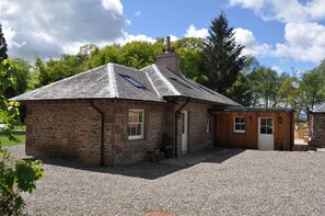 The Rear of the property with a utility/drying room suitable for small dogs.
