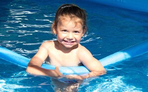 Young girl enjoying the pool