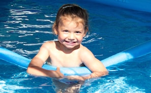 Young girl enjoying the pool