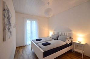 Bed 2 Comfortable Double.   Bedside light, clothes drawer, hangers & balcony.
