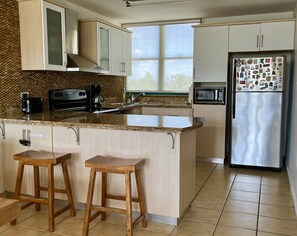 Additional stools at kitchen area
