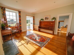 Entrance with Sitting Room on your LHS & Drawing Room on your RHS. 
Sea views. 
