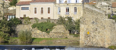 View of Les Tiers and Le Moulin from river beach