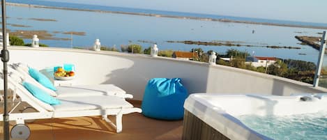 Private terrace with jacuzzi overlooking the Ocean and Ria Formosa!