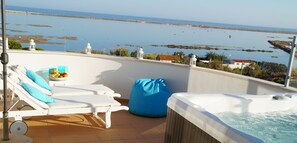Private terrace with jacuzzi overlooking the Ocean and Ria Formosa!