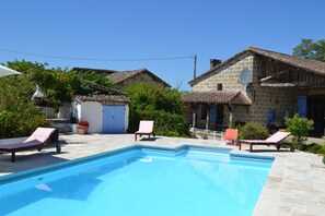 Lots of space at the pool for lounging and gated and walled for safety.