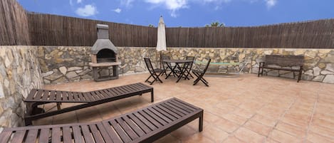 Rear terrace is large, private and child safe with eating and BBQ facilities.