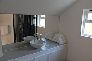 En-suite shower room to Poppy bedroom