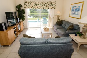 Family room with 55 inch HD cable TV.