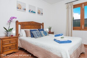 Residential villa, with pool and bedroom with a double bed