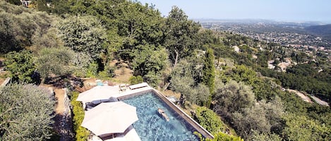 Horizon pool set into the olive grove - views of sea mountain lake & village.