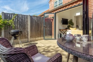 Driftwood Cottage, Brancaster: Barbecue and outdoor furniture, perfect for summer evenings