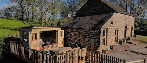 View of cottage with fields behind