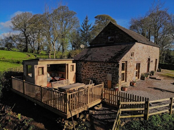 View of cottage with fields behind