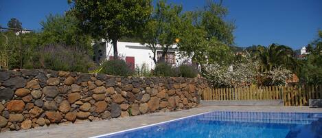 7m x 3m Gated swimming pool situated on the lower garden terrace