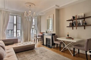 The living room and the dining area
