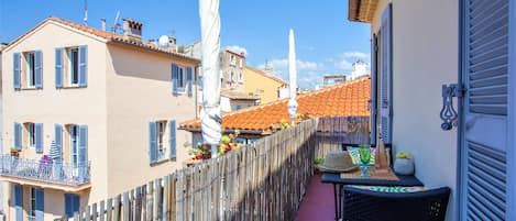 Sunny South facing balcony overlooking the roof tops of the Old Town Antibes