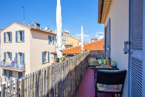 Sunny South facing balcony overlooking the roof tops of the Old Town Antibes
