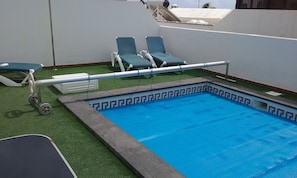 Pool with astro turf