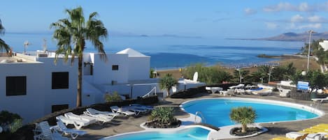 View from the balcony, 180 degree pool, sea, beach and mountain views!