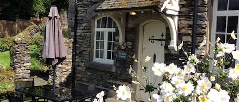 The cottage from the front garden in September 