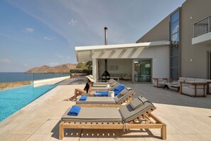 Blending into the dramatic coastal landscape