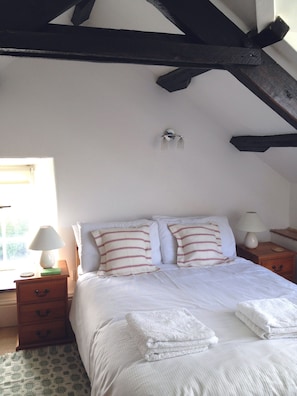 Master bedroom with beautiful beams